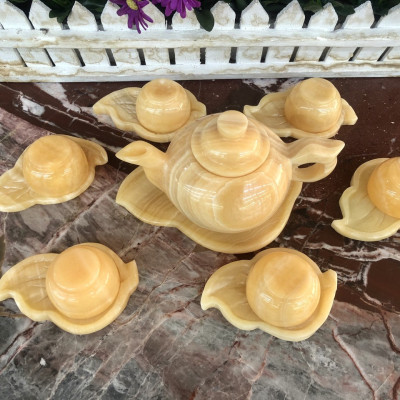 Bộ ấm trà với dĩa hình chiếc lá đá ngọc hoàng long