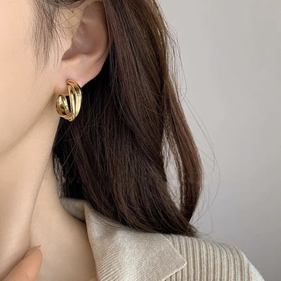 Bông tai nữ dáng cuộn tròn màu vàng nhiều vòng