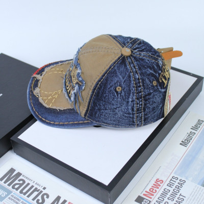 Nón nam, mũ lưỡi trai Ông Địa Religion tưa phối vải jeans form đẹp thời trang đường phố