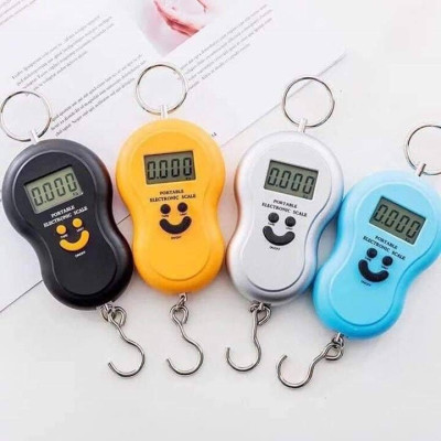 CÂN ĐIỆN TỬ CẦM TAYCÂN MINI ĐIỆN TỬ CẦM TAY HÌNH MẶT CƯỜI SỬ DỤNG CÂN HÀNG HOẶC ĐI CHỢ TIỆN LỢI