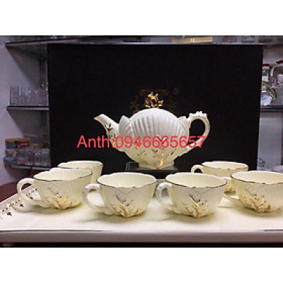 Bộ bình trà sứ màu trắng ngà dáng vỏ sò sang trọng
