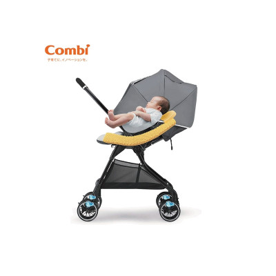 Xe đẩy Combi Sugocal Compact 4 bánh quay tự động màu đỏ