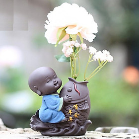 Tượng chú tiểu cưỡi cá chép - trồng cây, cắm hoa để bàn 