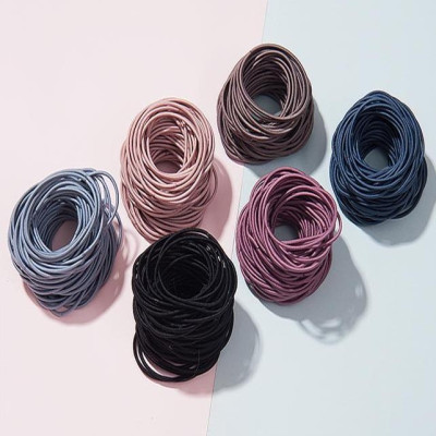 Set 100 dây cột tóc trơn kèm túi khóa đựng dễ thương