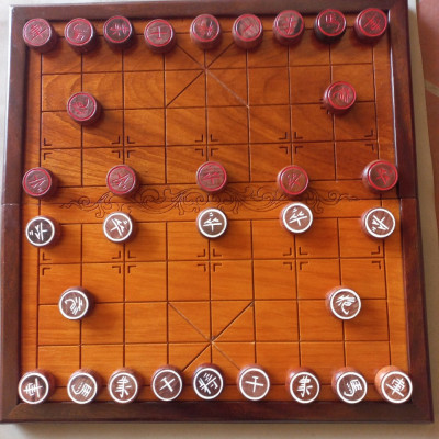 Bộ bàn cờ tướng gỗ gõ và quân gỗ hương đủ bộ 