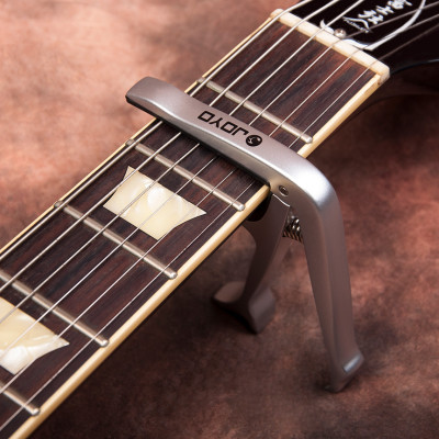 Capo guitar cao cấp Joyo JCP02 dùng cho đàn guitar acoustic và classic ( Có thêm chức năng nhổ chốt và mở nắp chai ) - Hàng chính hãng