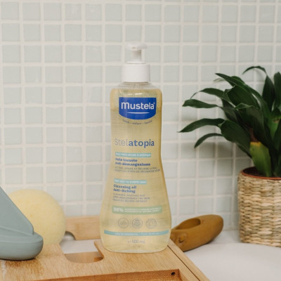 Dầu tắm gội Cho Trẻ Sơ Sinh & Em Bé Da Chàm Thể Tạng Mustela Stelatopia Cleansing Oil 500ml