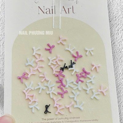Set 50 Chiếc Charm Nơ Nhựa Nổi 3D SJY Mẫu Mới Làm Nail Siêu Xinh, Nơ Nút Thắt Ruy Băng Mix Màu Trắng Hồng Đen Size Mini Trang Trí Móng Hàn Quốc