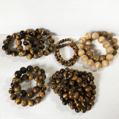 Vòng tay đá mắt hổ đường kính hột 15 ly cho người mệnh Kim và Thổ