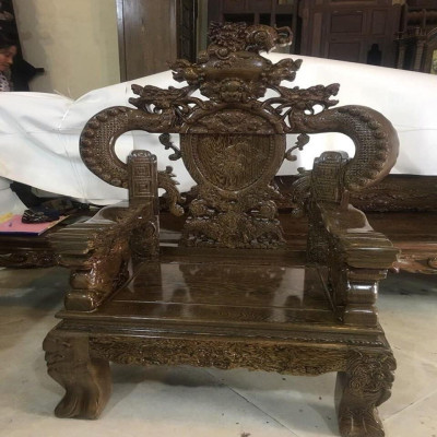 Bộ Bàn Ghế Nghê Đỉnh Rồng Phương Gỗ Mun Đuôi Công