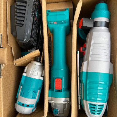 BỘ COMBO 3 MÁY KHOAN ĐỘNG LỰC, MÁY MÀI GÓC VÀ MÁY SIẾT  VÍT DÙNG PIN 20V (2 pin  4.0Ah & 1 sạc) TOTAL TOSLI2301510 - HÀNG CHÍNH HÃNG