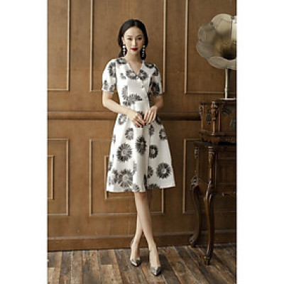 Đầm xòe hoa cúc Tri