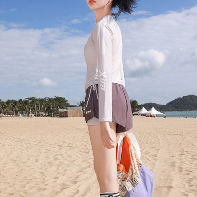 Đồ Bơi Nữ Dài Tay Rút Dây Bên Hông